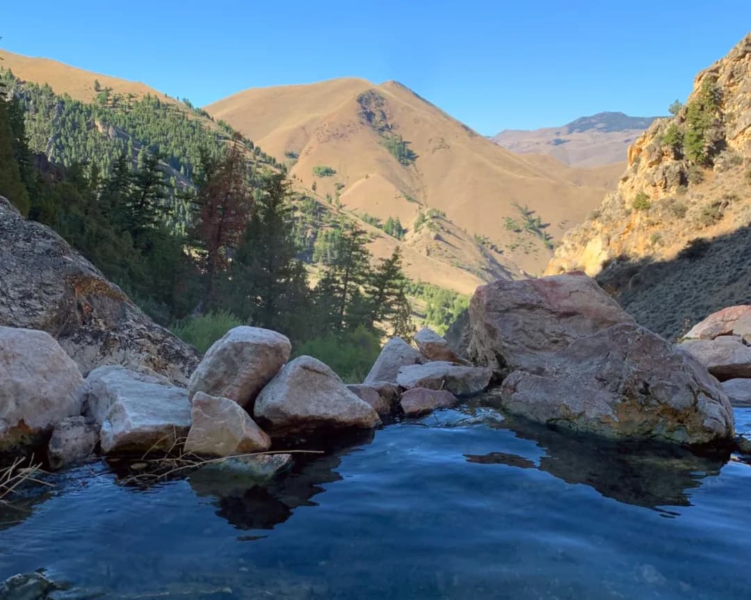 Goldbug Hot Springs cascading thermal pools in rocky canyon near Salmon Idaho
